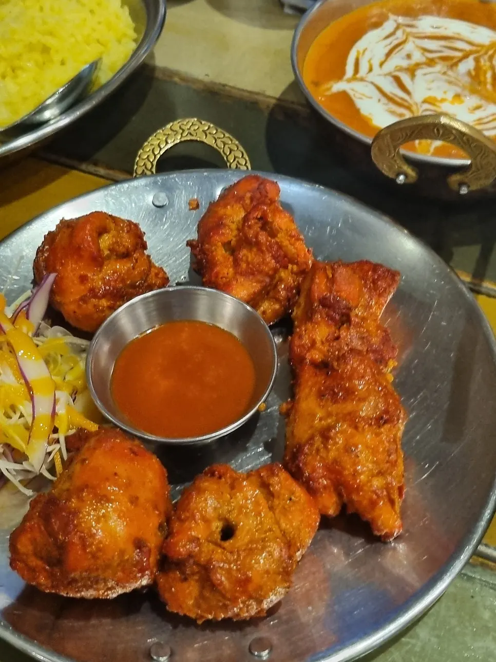 Butter chicken curry paired with garlic naan