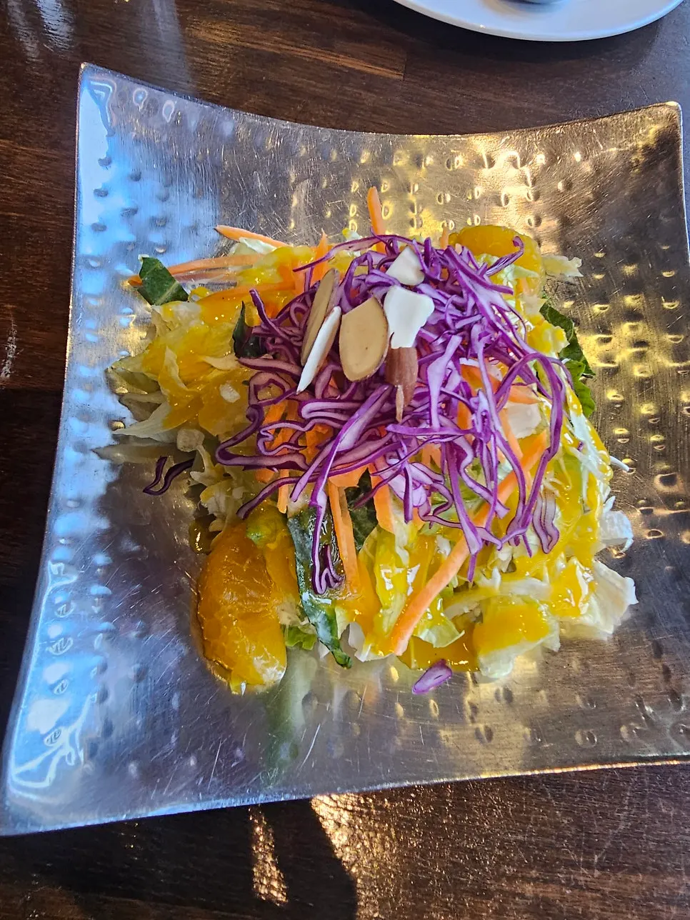 Plate of green salad with toppings