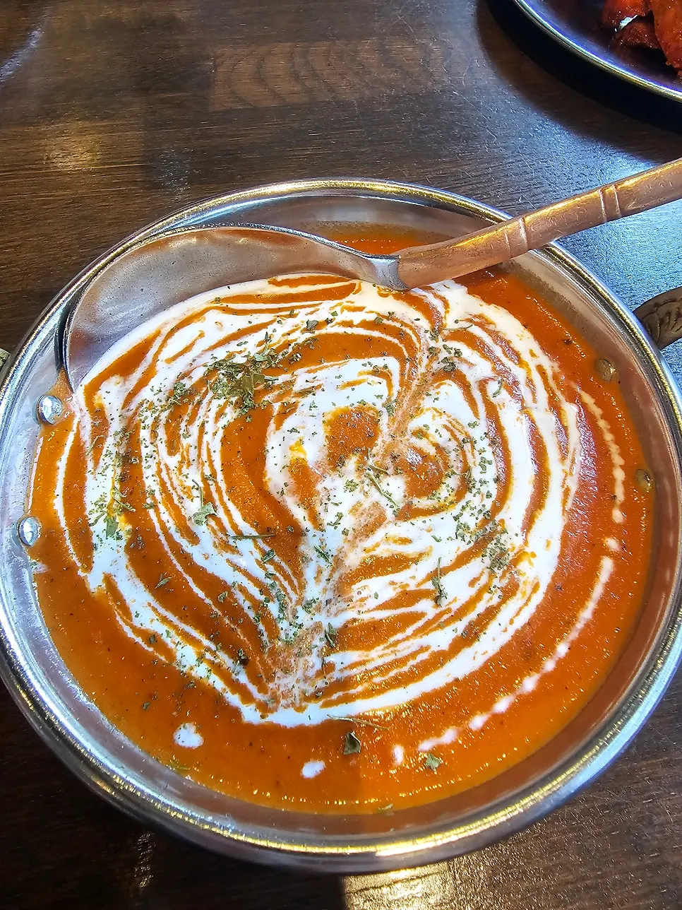 Butter chicken curry generously loaded with chicken