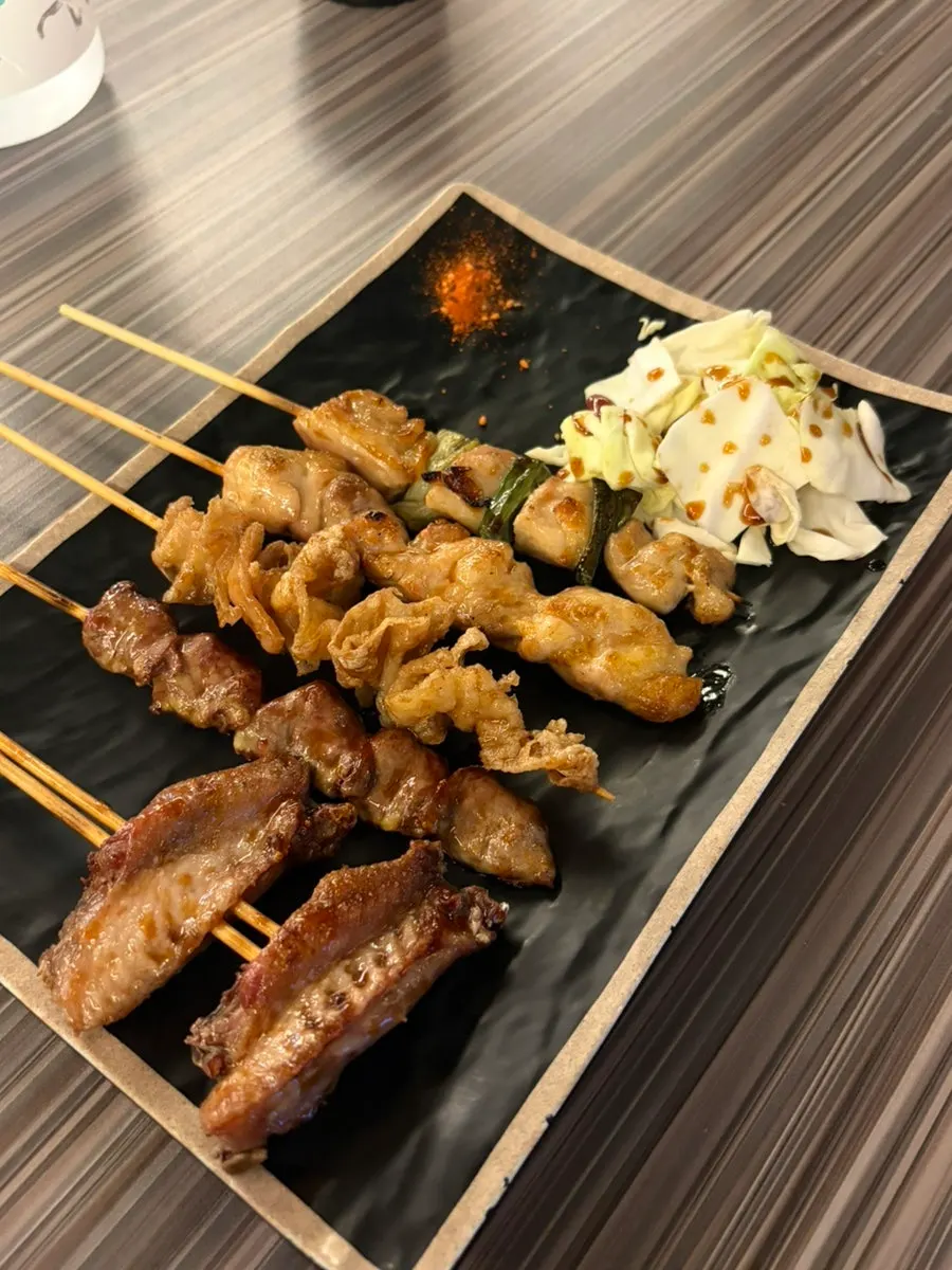 Side dishes for two laid out at Hanamato