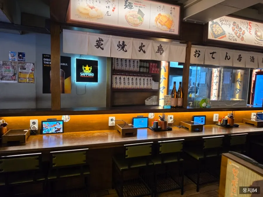 Bar-table seating on Hanamato's first floor