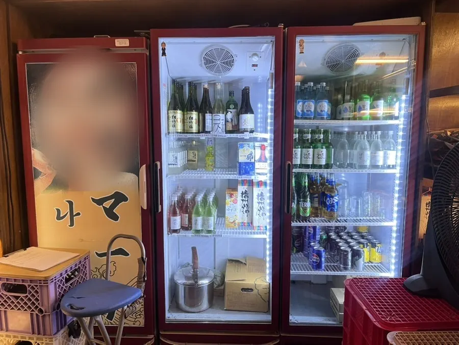 은은한 조명이 켜진 하나마토 이자카야 내부