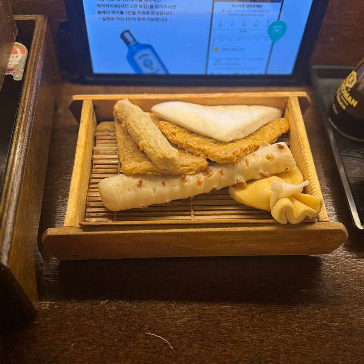 A pot of oden simmering on a personal induction burner