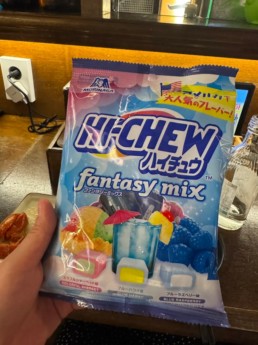A shelf of Japanese snacks and character goods