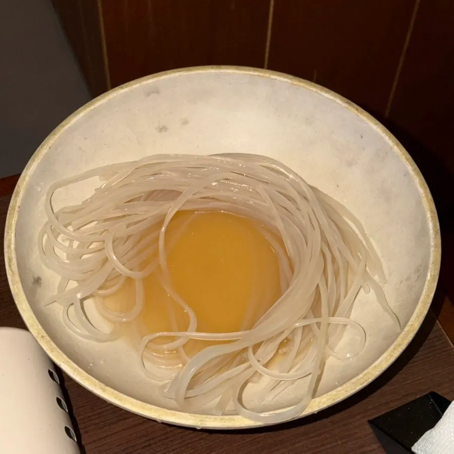 Rice cake layer at the bottom of the stew