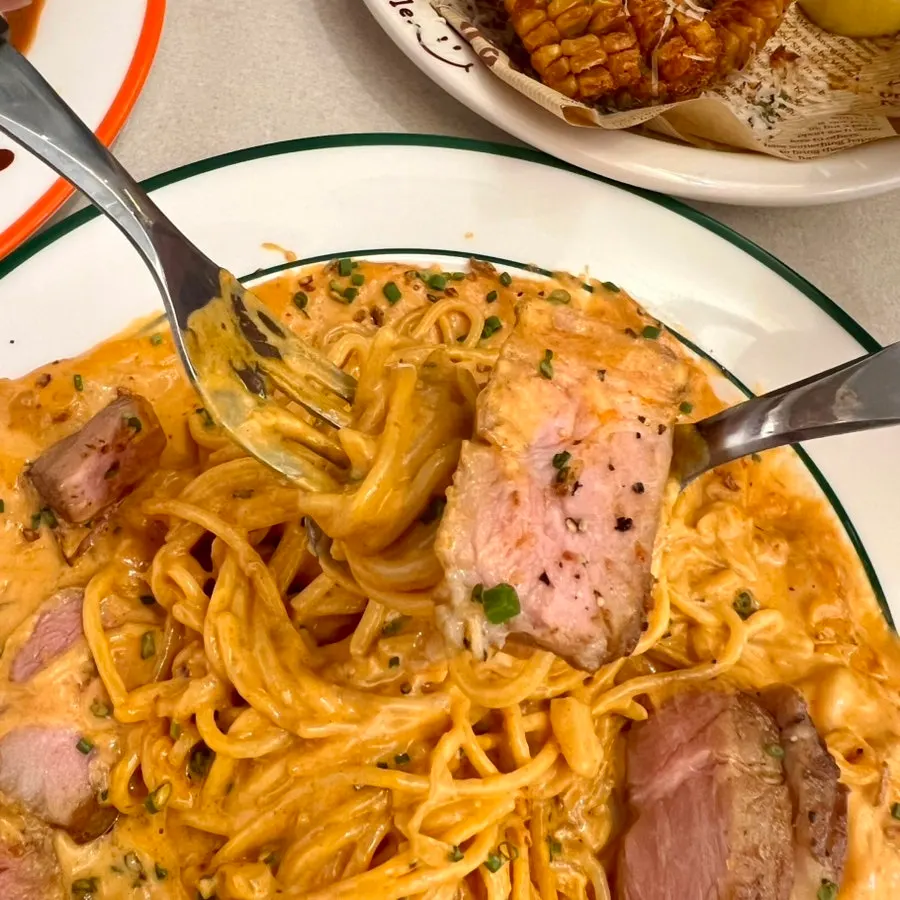 Pasta twirled around a fork