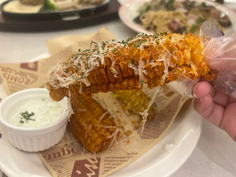 Fried corn eaten with sauce