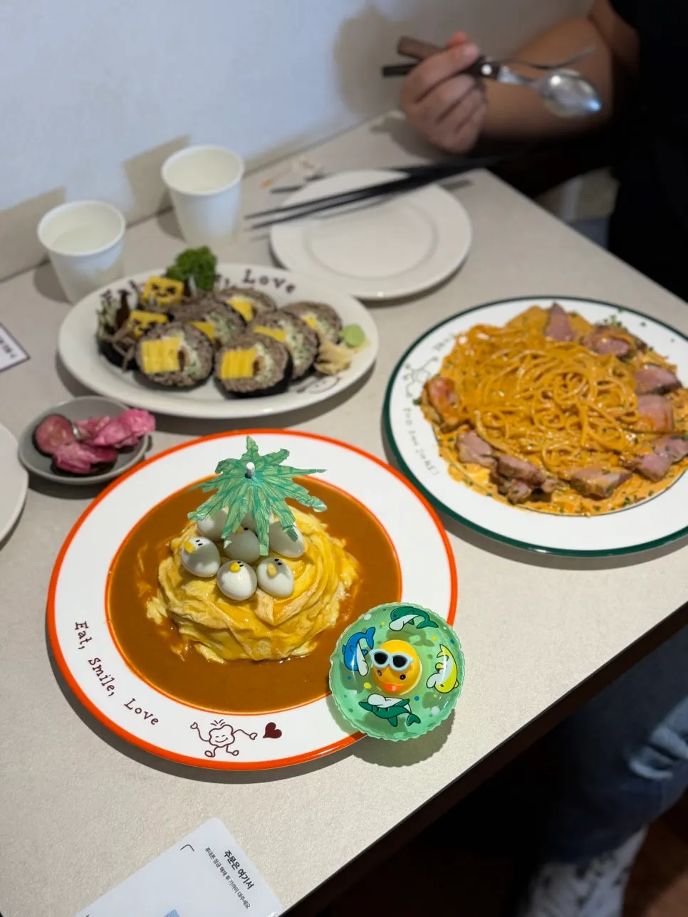 Omil's signature rubber-duck omurice