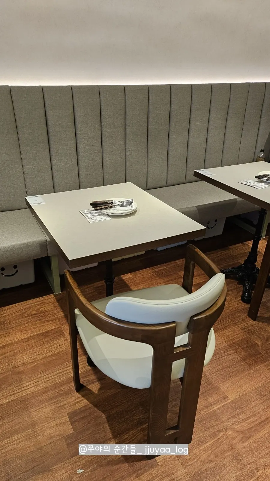 Built-in sofa table seating at Omil Hyehwa Daehangno