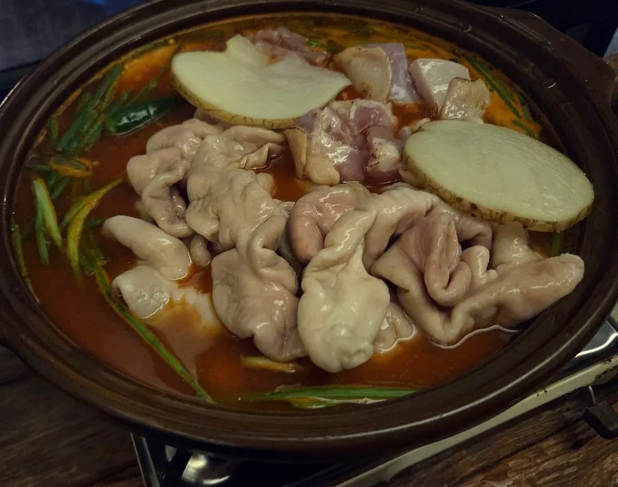 Tteokgopdoritang loaded with chicken thigh meat and pork gopchang