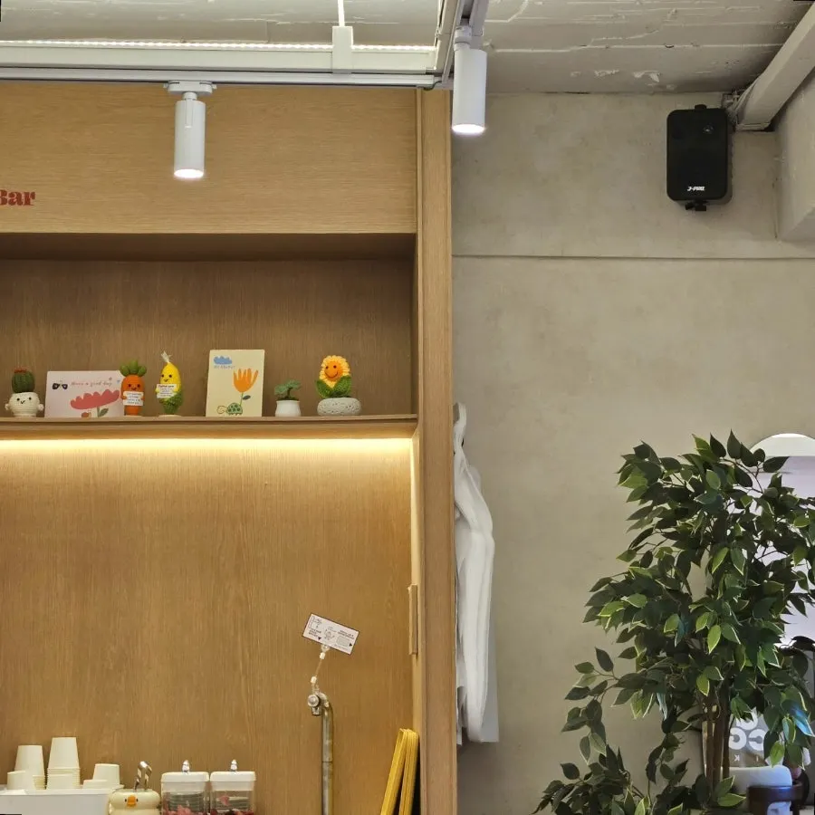 Self-service bar set up with aprons and water