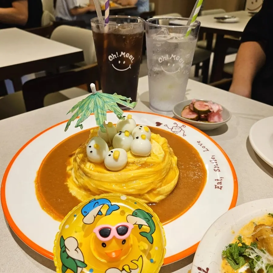Close-up of omurice decorated with quail eggs