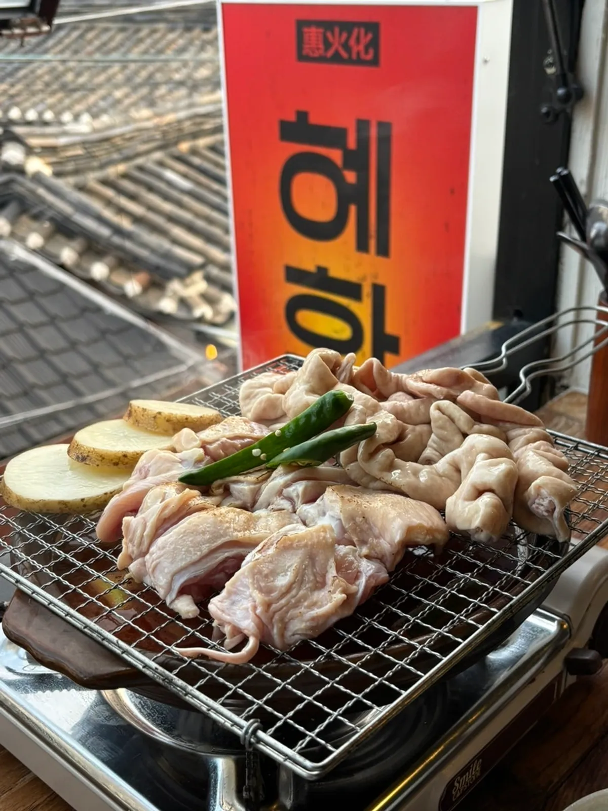 Straw-fire seared spicy gopdori-tang piled high with gopchang