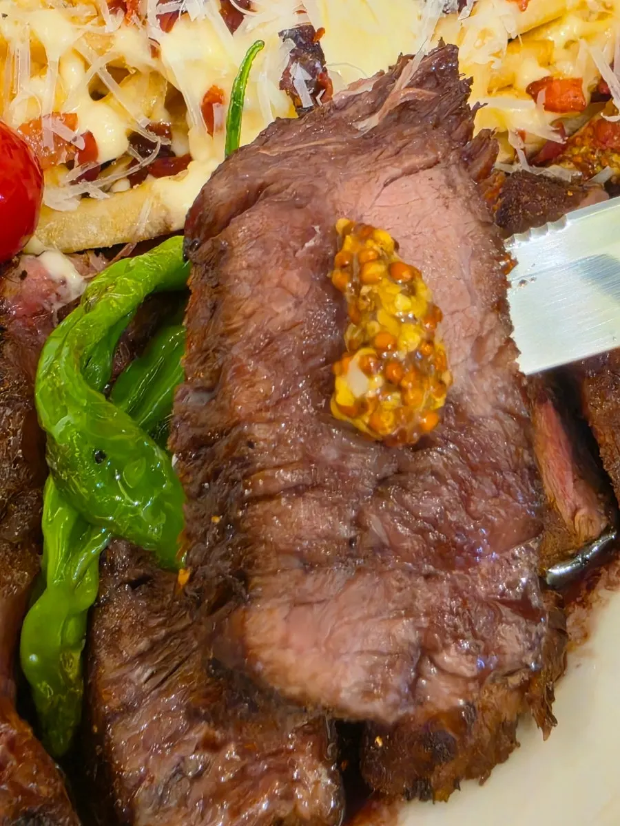 Omil steak served with red wine sauce