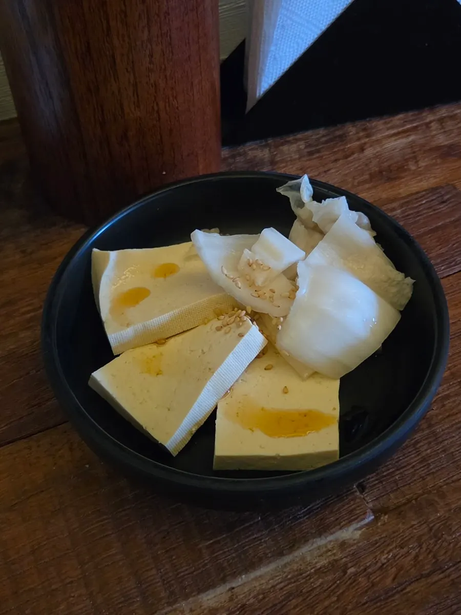 Spicy gopdori-tang with rice cake, glass noodles, and potato