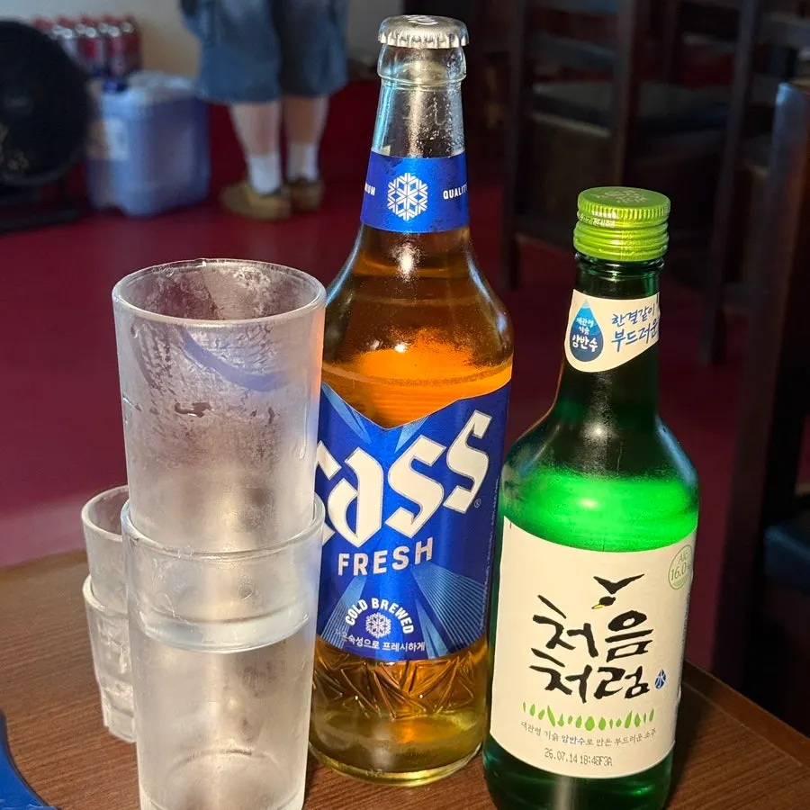 Table set at Hyehwahwa with a glass of soju-beer