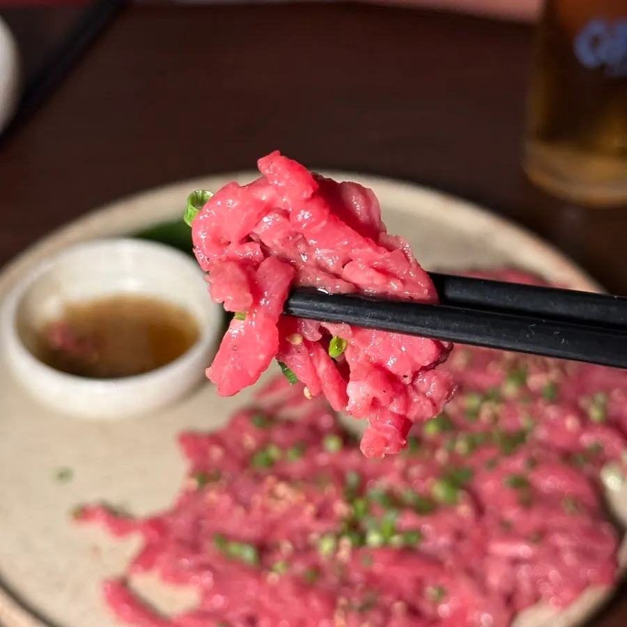 Close-up of beef tartare with sesame oil dipping sauce