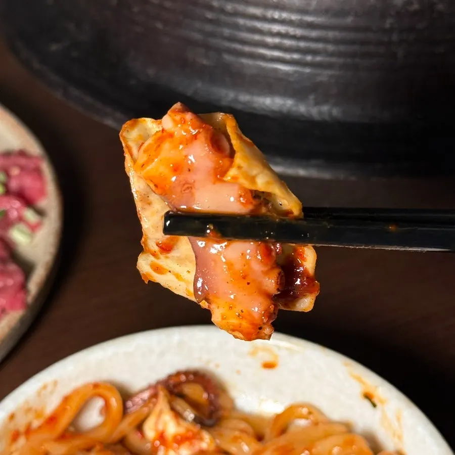 Octopus and cabbage tossed in spicy sauce