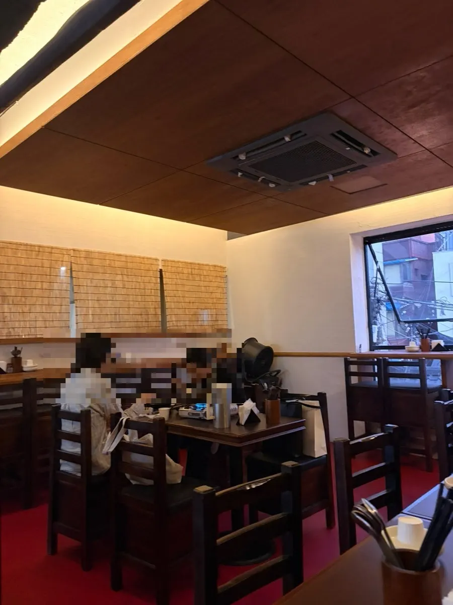 Hyehwahwa's dining hall with view of the open kitchen