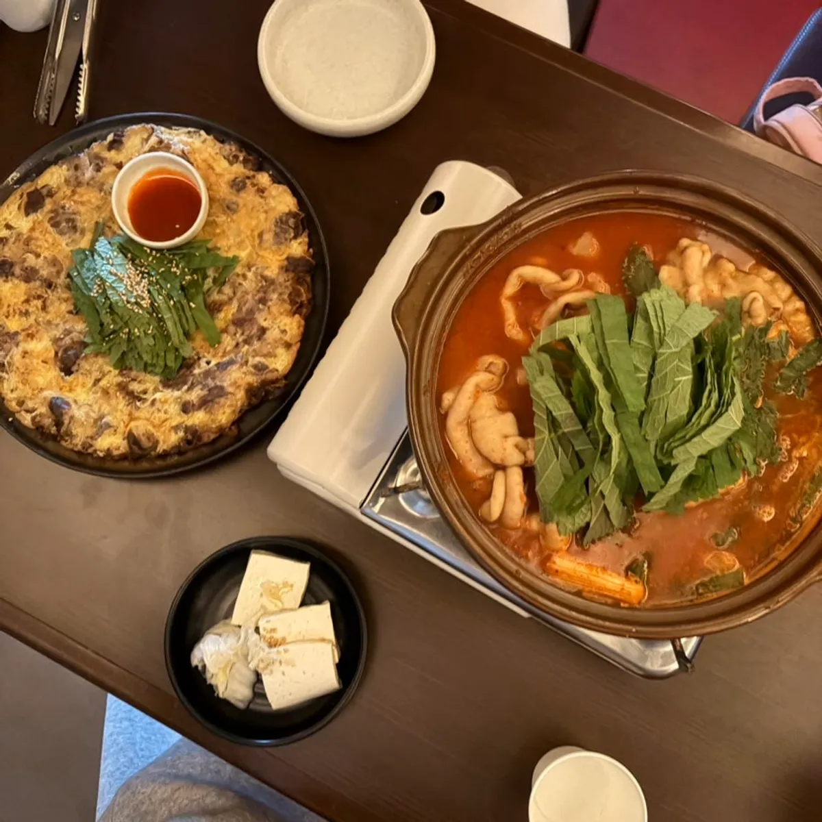 Charcoal-grilled gopchang bomb spicy stew with perilla leaves