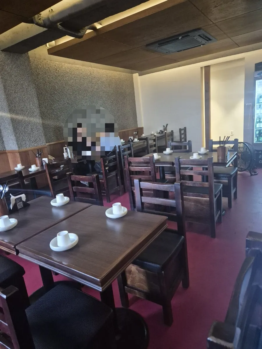The bar table seating by the kitchen at Hyehwahwa