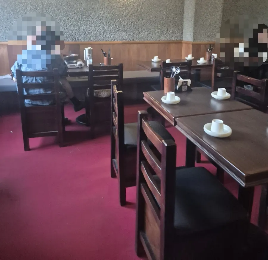 The interior of Hyehwahwa with the open kitchen visible