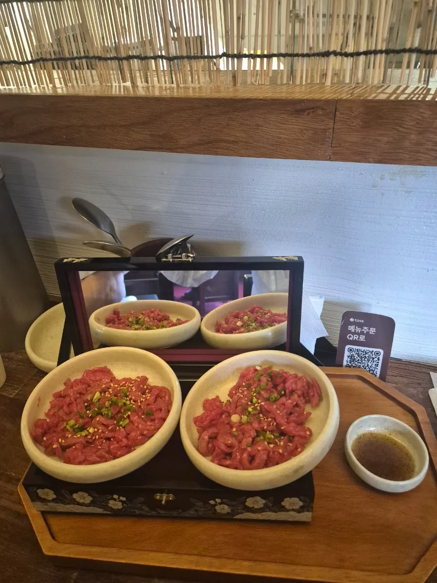 Cooking in progress at Hyehwahwa's open kitchen