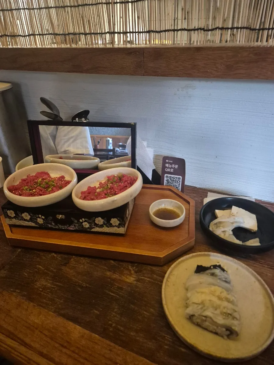 A spread of Korean-style dishes at Hyehwahwa