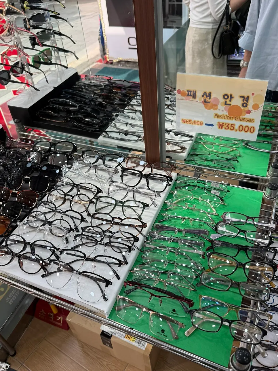 Metal and horn-rim frames in the central showcase