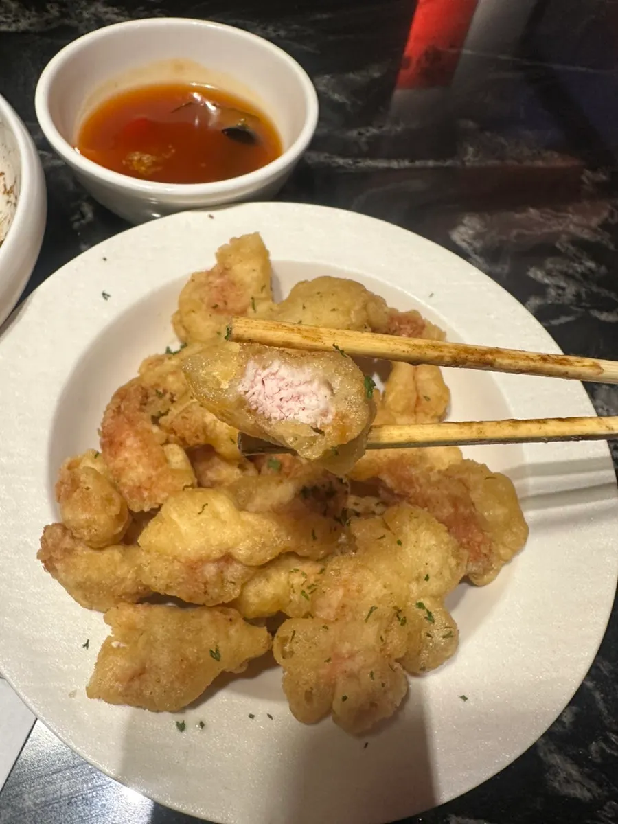 Cross-section of sweet and sour pork with sauce