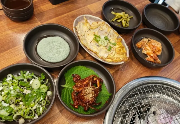 Full spread of Galbijeong's basic side dishes