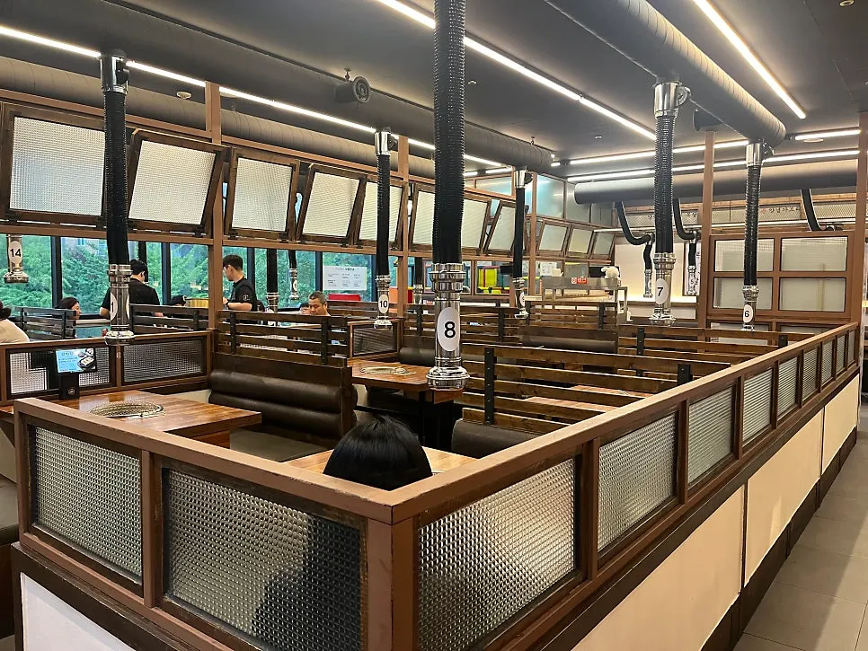 Wide view of Galbijeong's spacious dining hall and tables