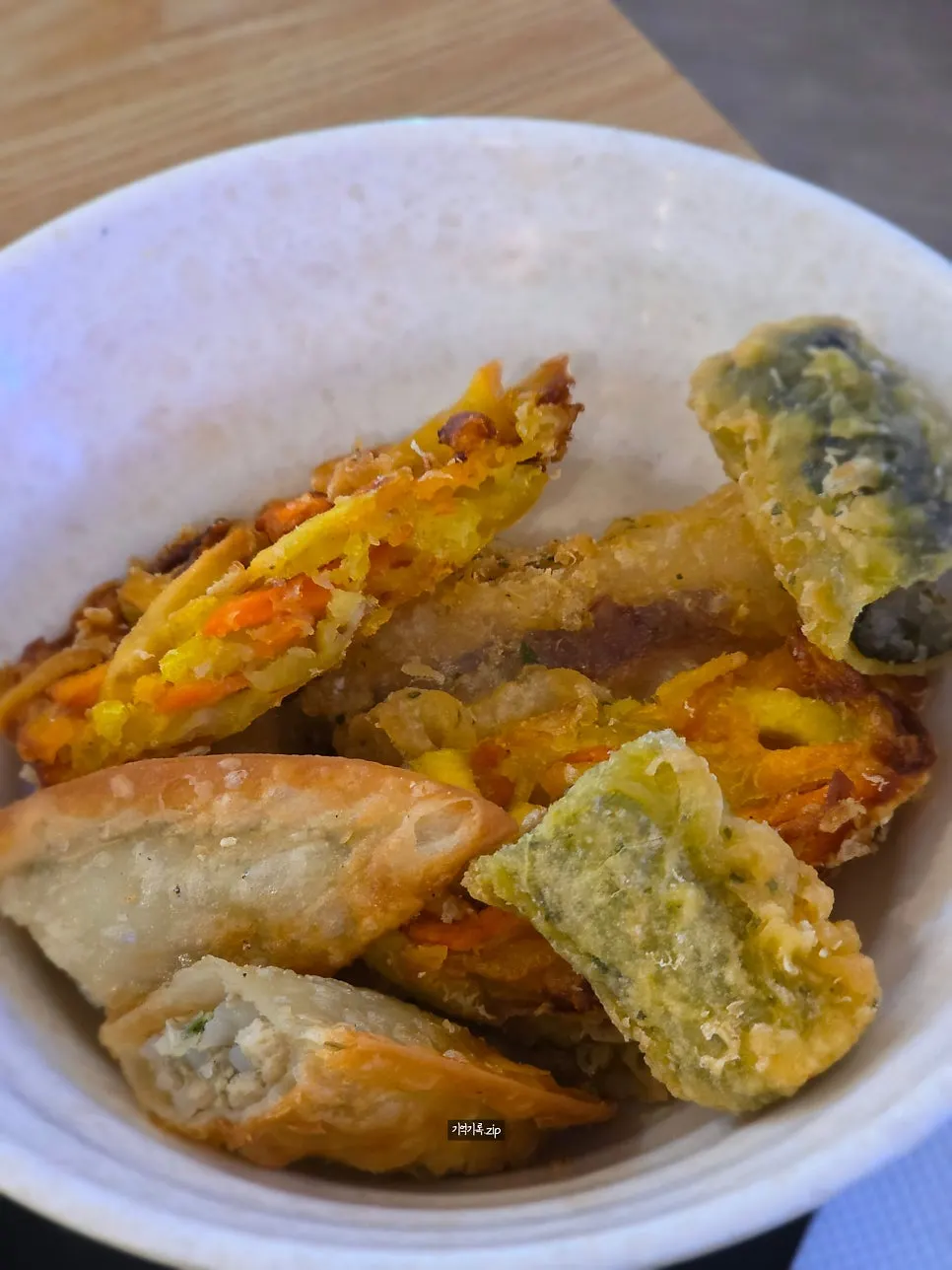 Five kinds of mixed fritters served halved