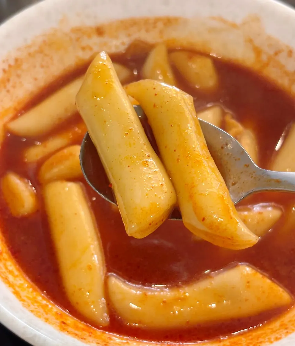 A spoonful of tteokbokki broth