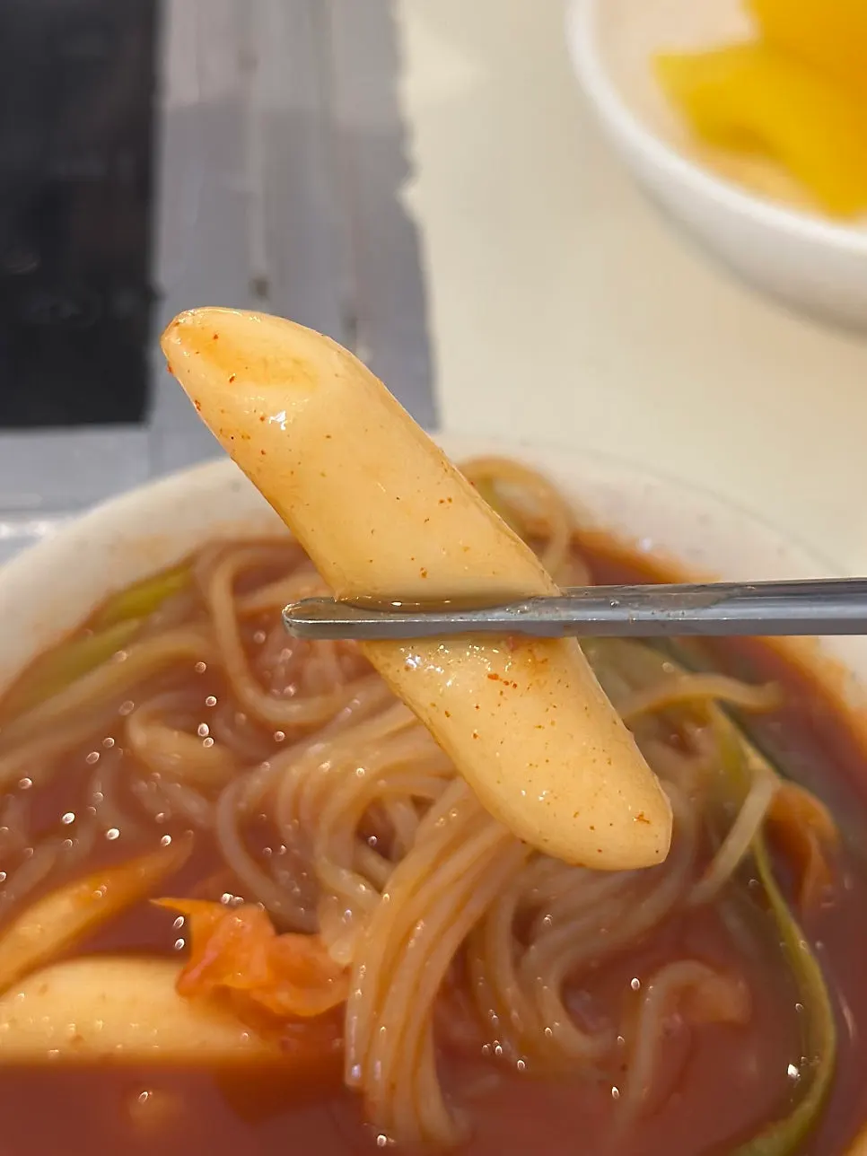 Pot with chewy rice cake and jjolmyeon mixed together