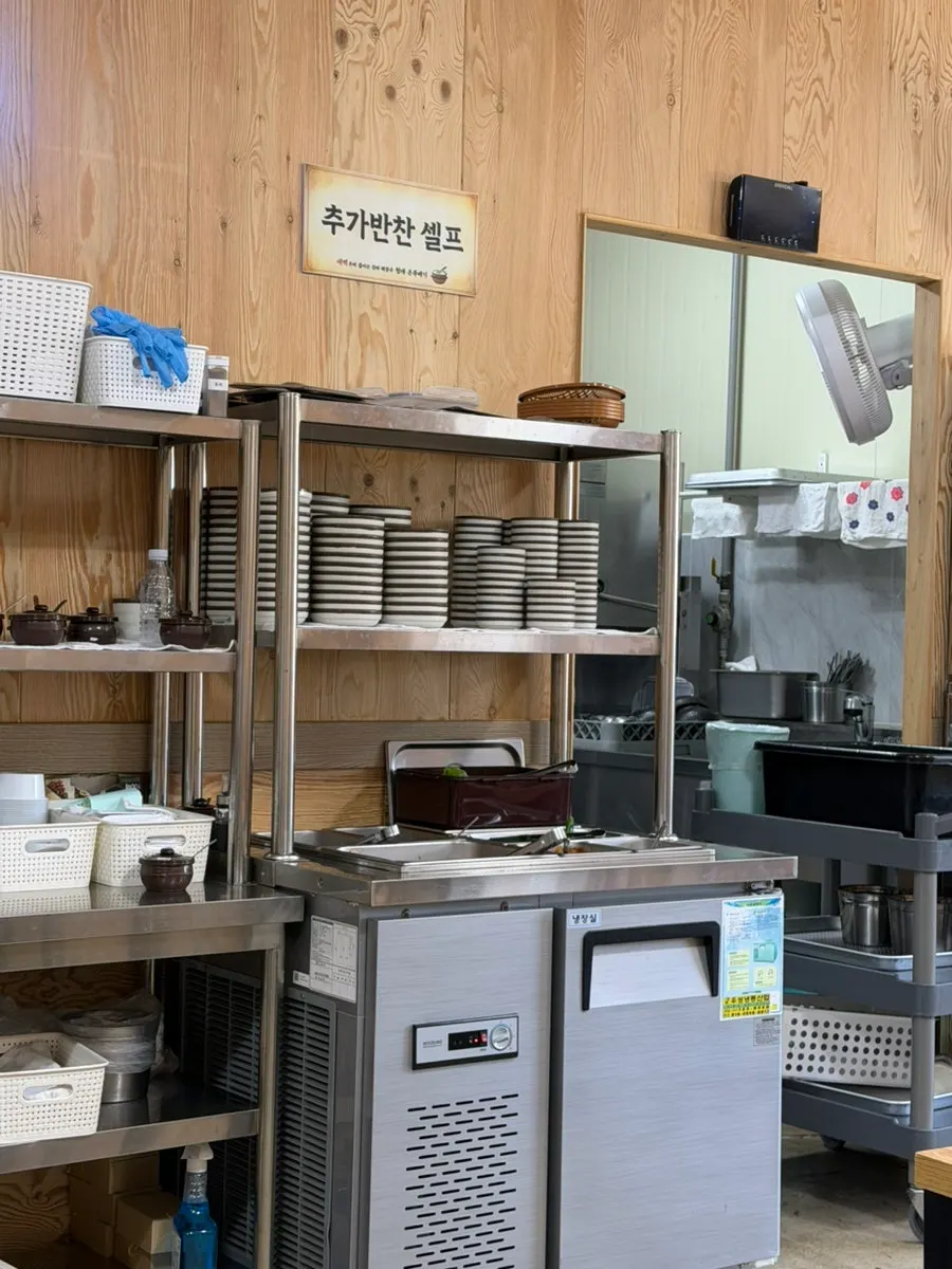 Self-serve side dish corner where guests help themselves