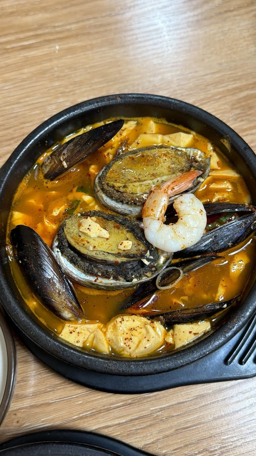 Abalone soondubu packed with tofu and seafood