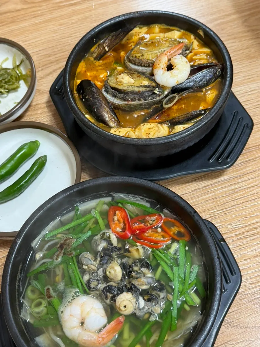 A full meal of abalone soondubu served with rice