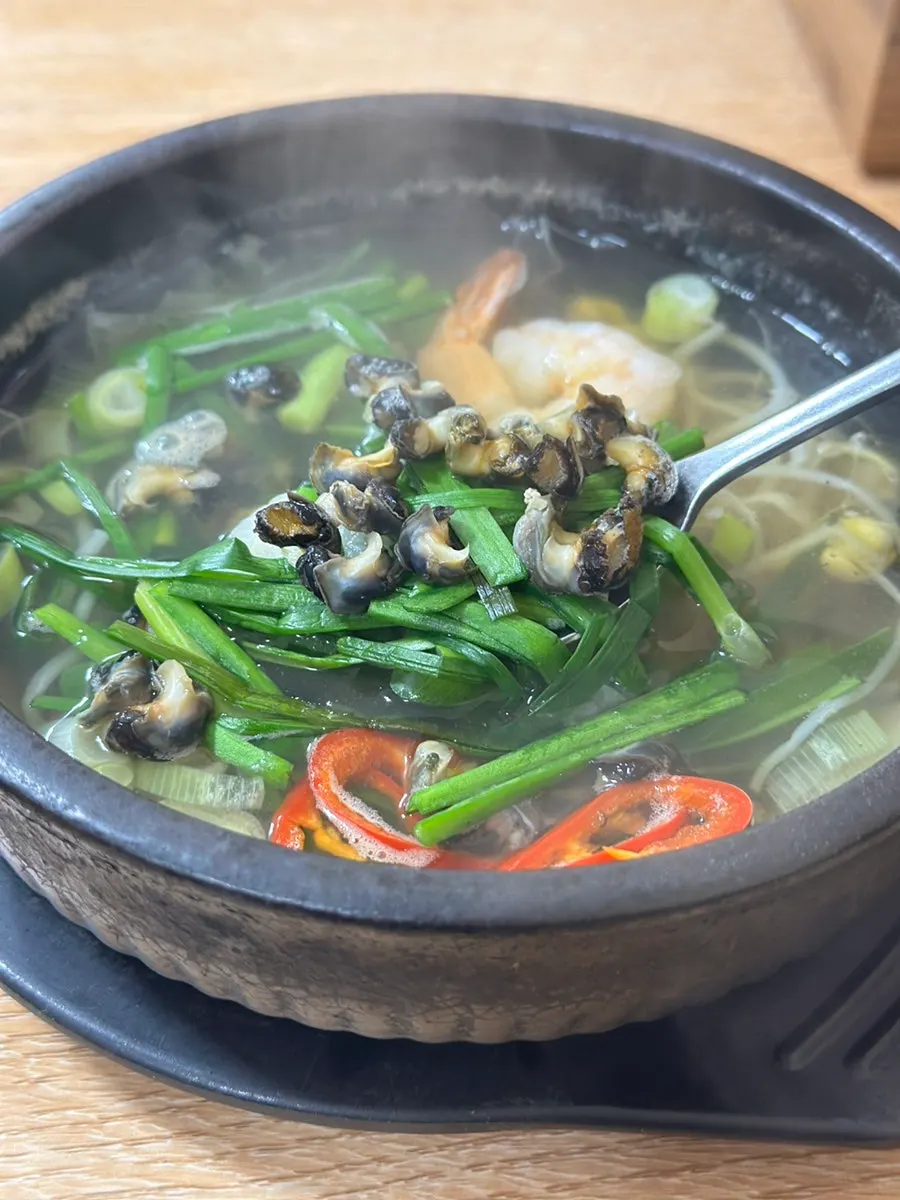 Bepokjaengguk broth served with a bowl of rice
