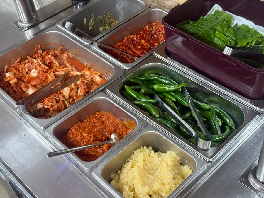 Neatly arranged self-serve extra side dish bar