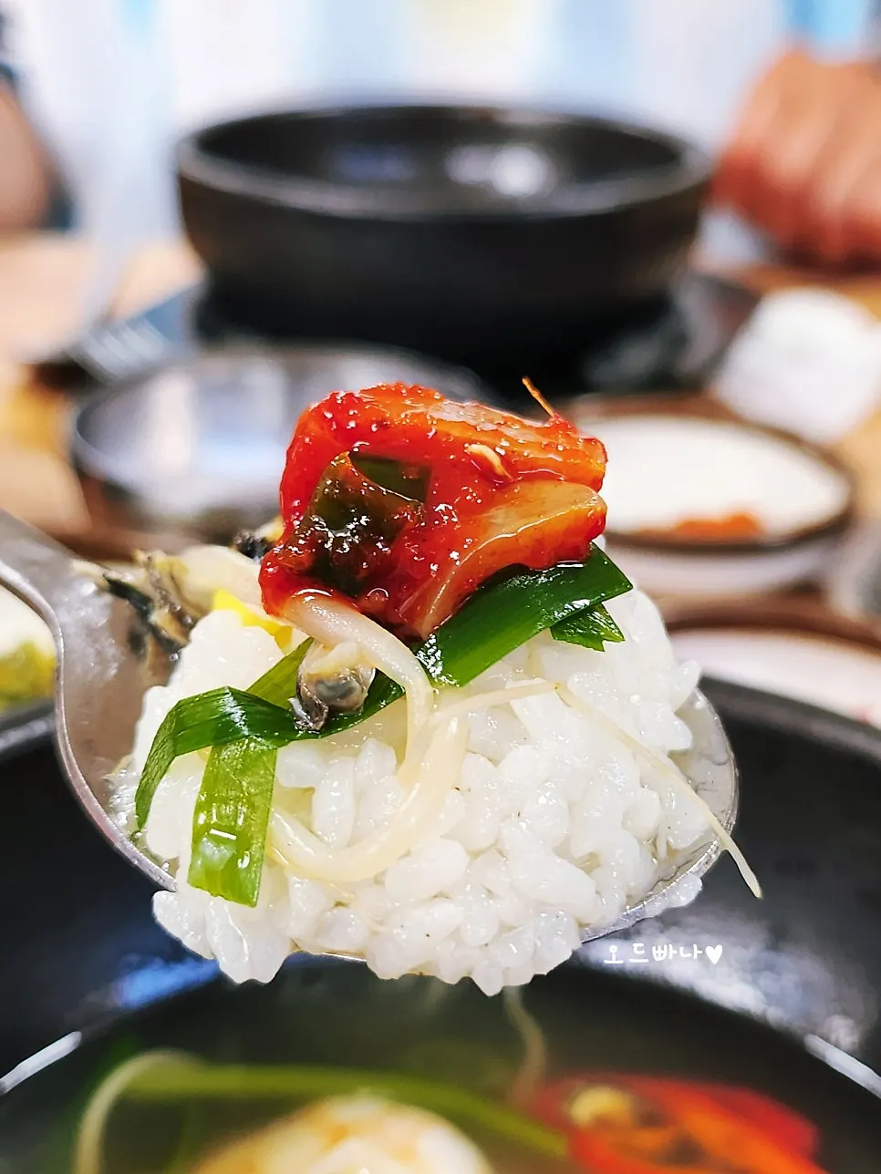 Broth and ingredients in bomal haejangguk