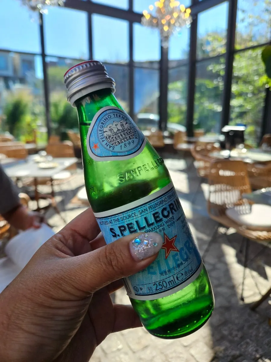 San Pellegrino sparkling water on the table