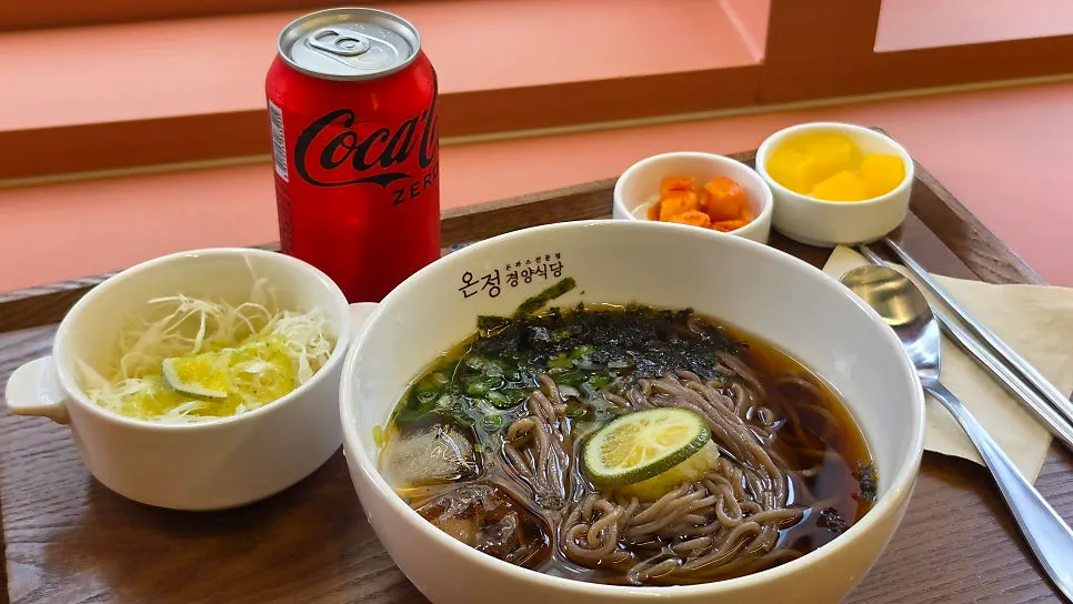 Green tangerine cold soba topped with citrus