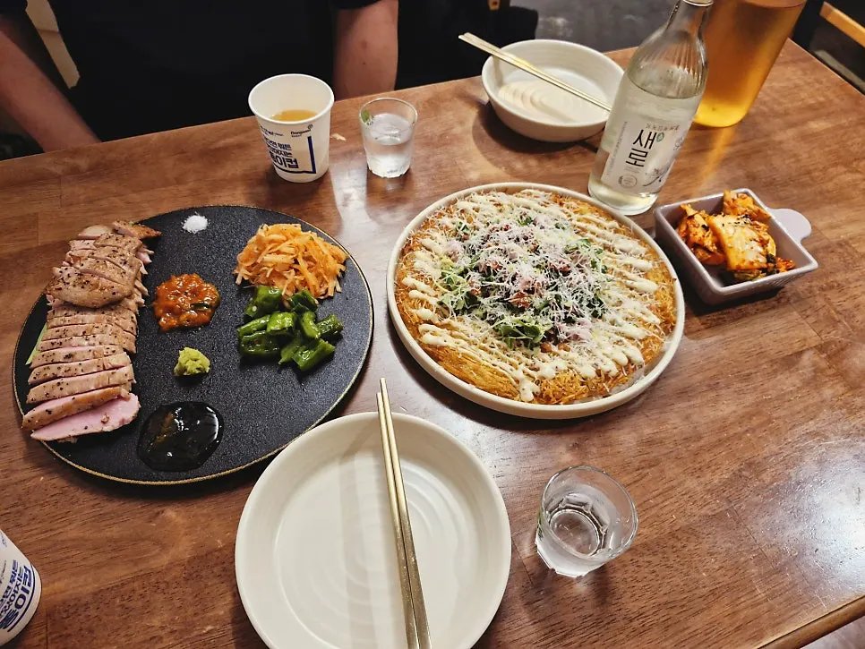Sous vide beef tenderloin and spring potato pancake spread at Hyeondae Memil
