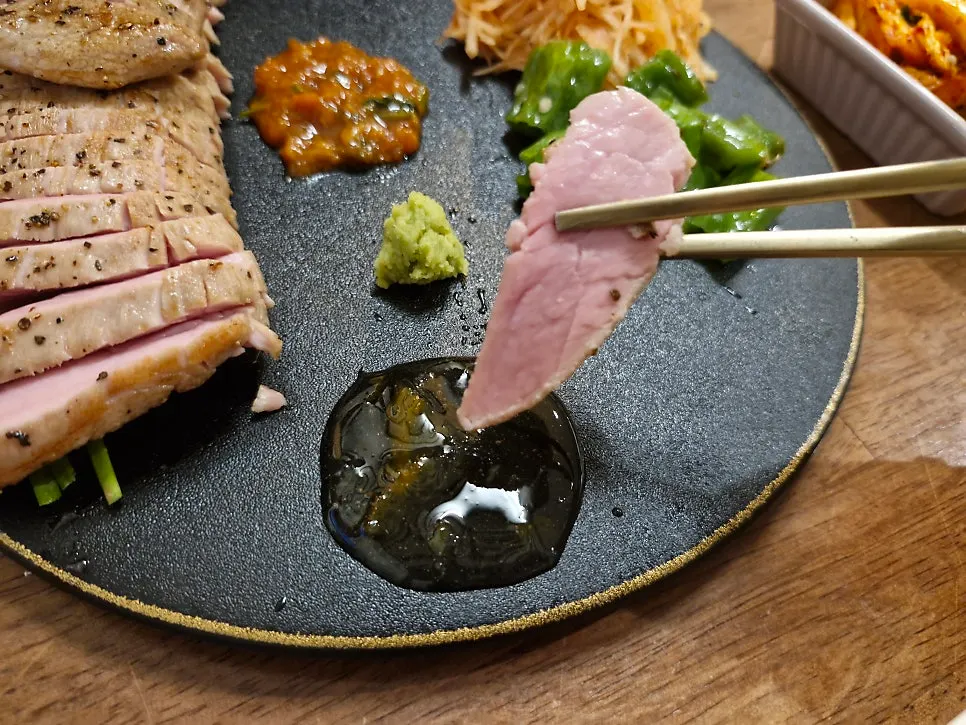 Yuzu syrup sauce served alongside the tenderloin