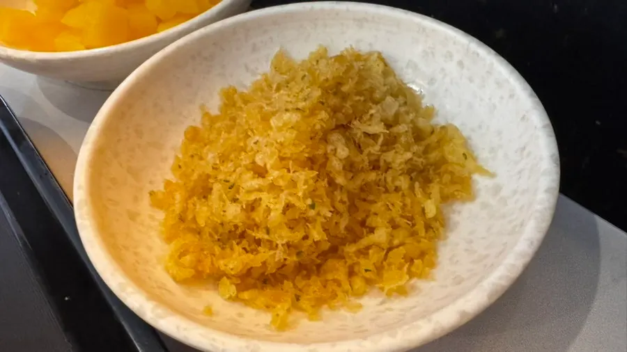 Squiggly fish cake broth with fried tofu and soft rice cake