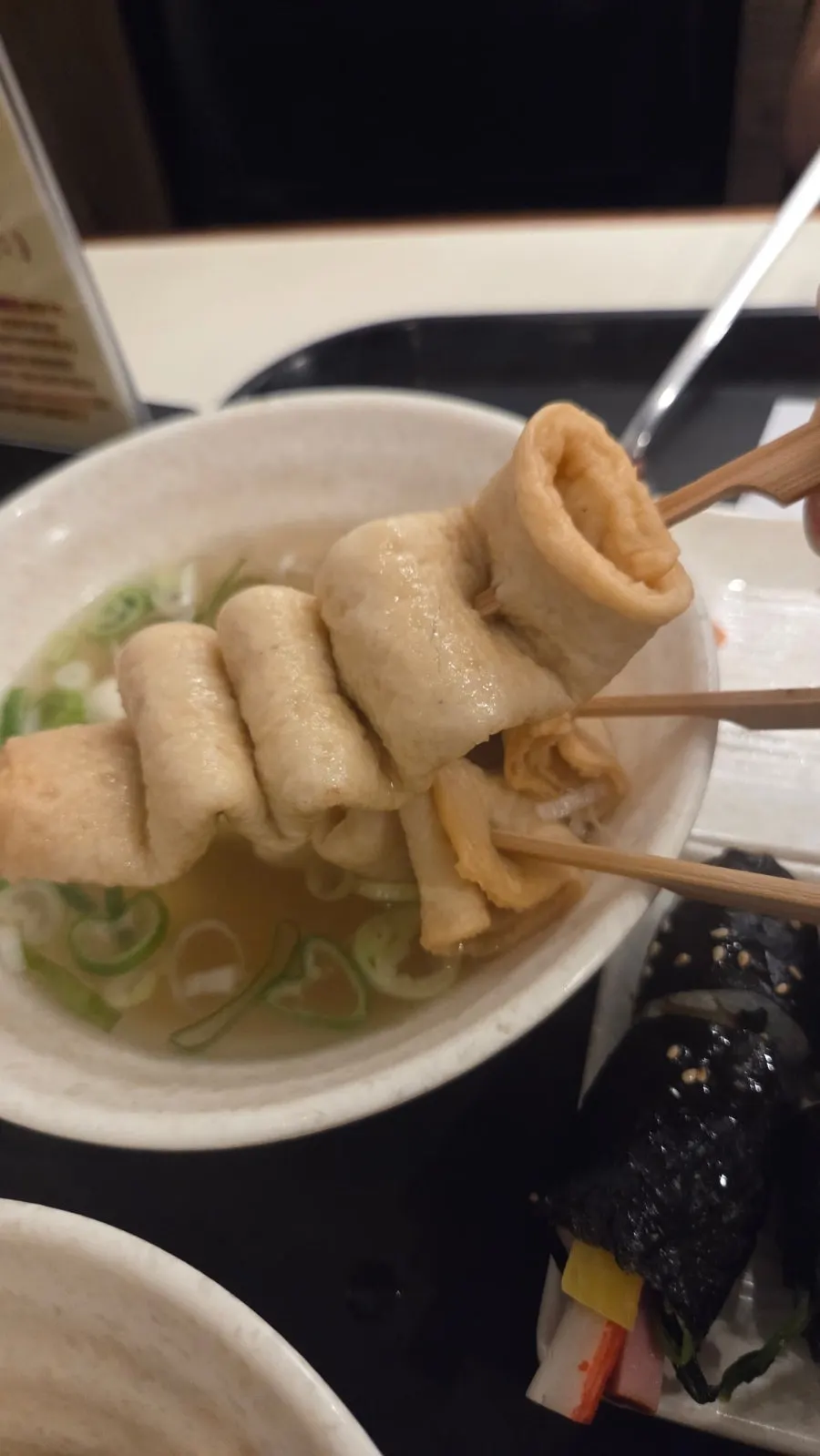 Fried snacks dipped in tteokbokki broth