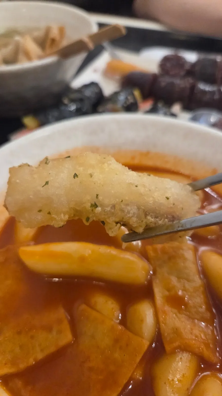 Mild tteokbokki broth eaten together with a child