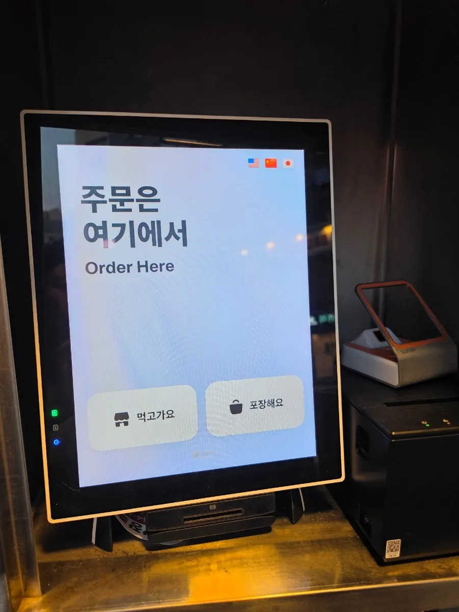 Snack food menu board including the Hyeonseoni Combo Set