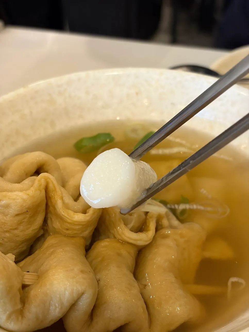 3-skewer squiggly fish cake served with broth